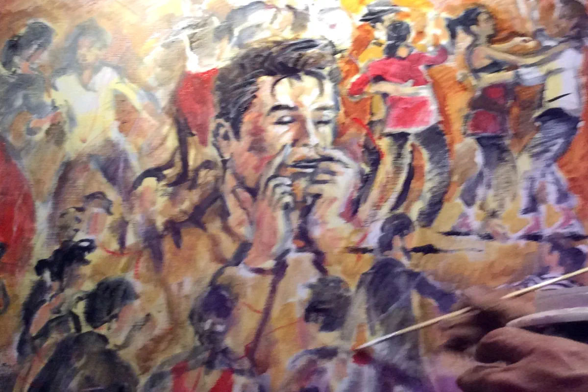 Peinture représentant un joueur de guimbarde au milieu d’une scène musicale.